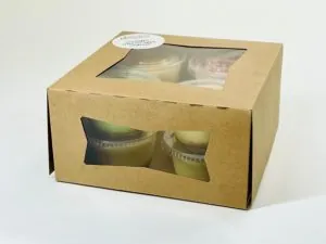 Kraft gift box of individual cheesecake cups, window view