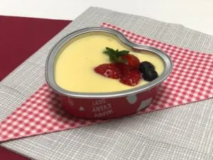 Heart-shaped cheesecake topped with fresh berries